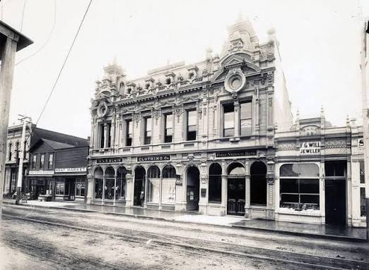 Historic Flinn Block in downtown Albany, Oregon, with its original ornate roofline and First National Bank storefront