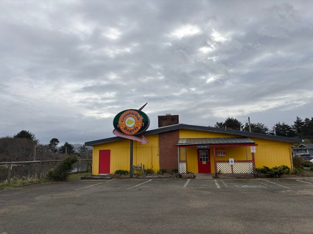 The yellow Grumblefish Bagels building on SE First Street in Lincoln City.