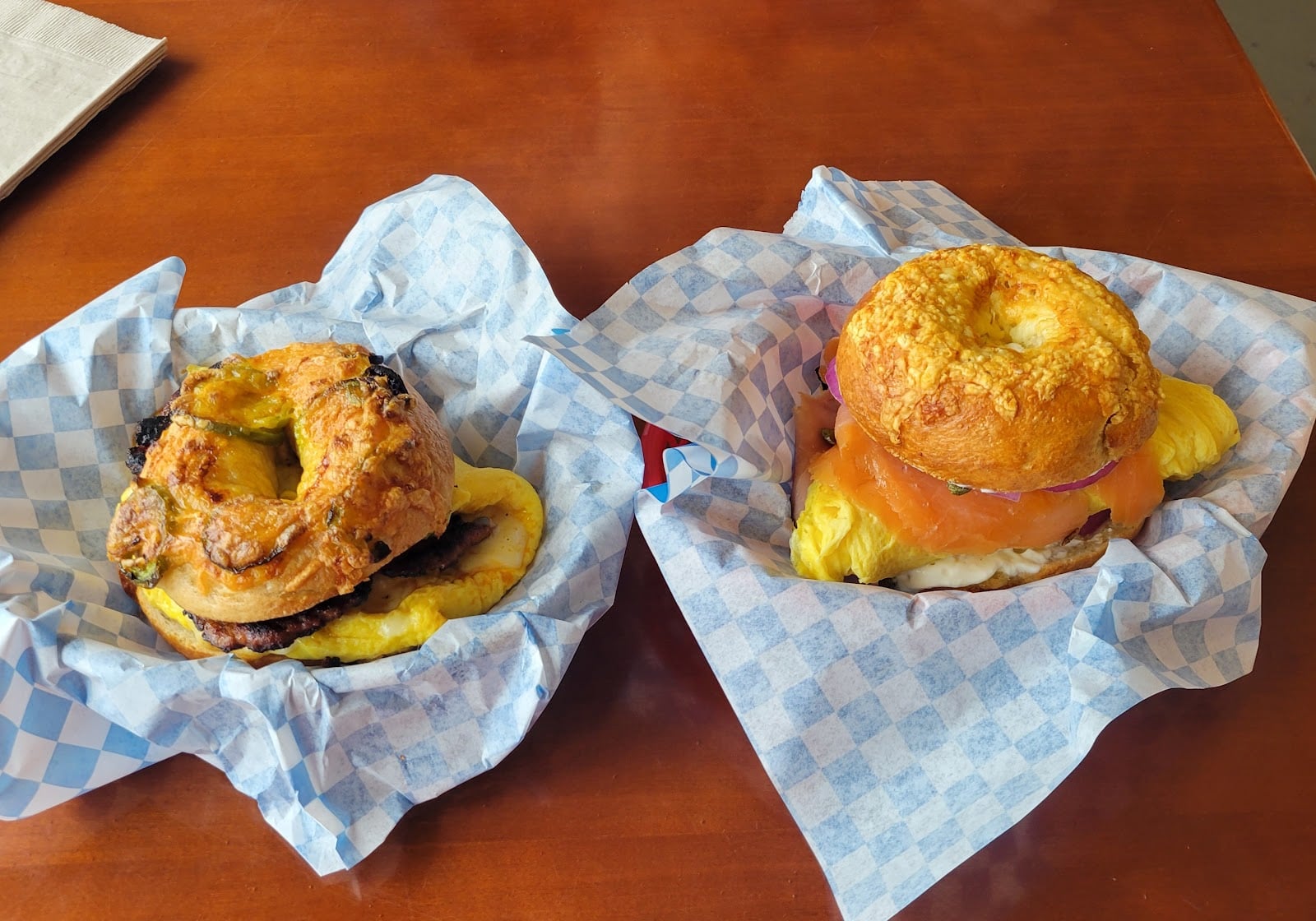 Two breakfast bagel sandwiches at Grumblefish Bagels in Lincoln City.