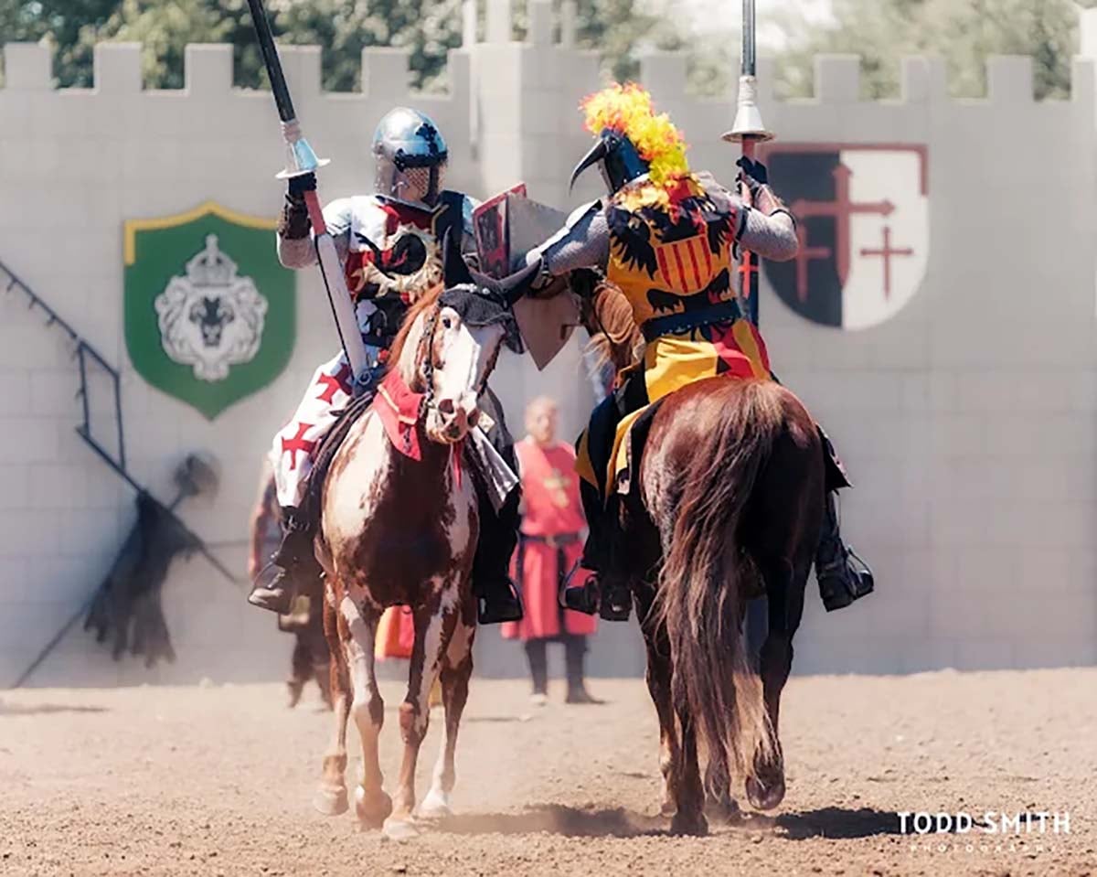 oregon-renassance-faire Armored knights charging toward each other during a Renaissance faire joust