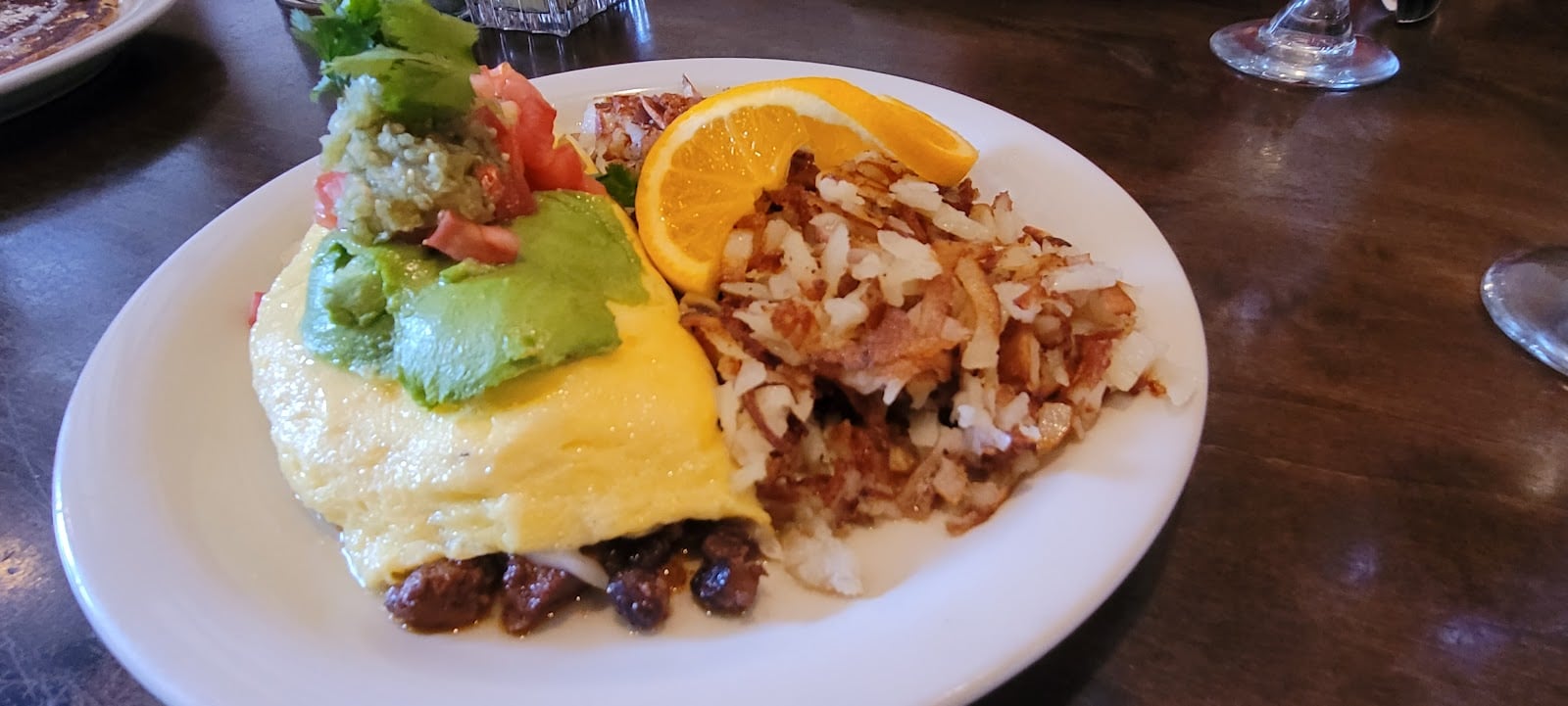 Eggs, avocado, and potatoes from a customer’s breakfast at Brick & Mortar Cafe.