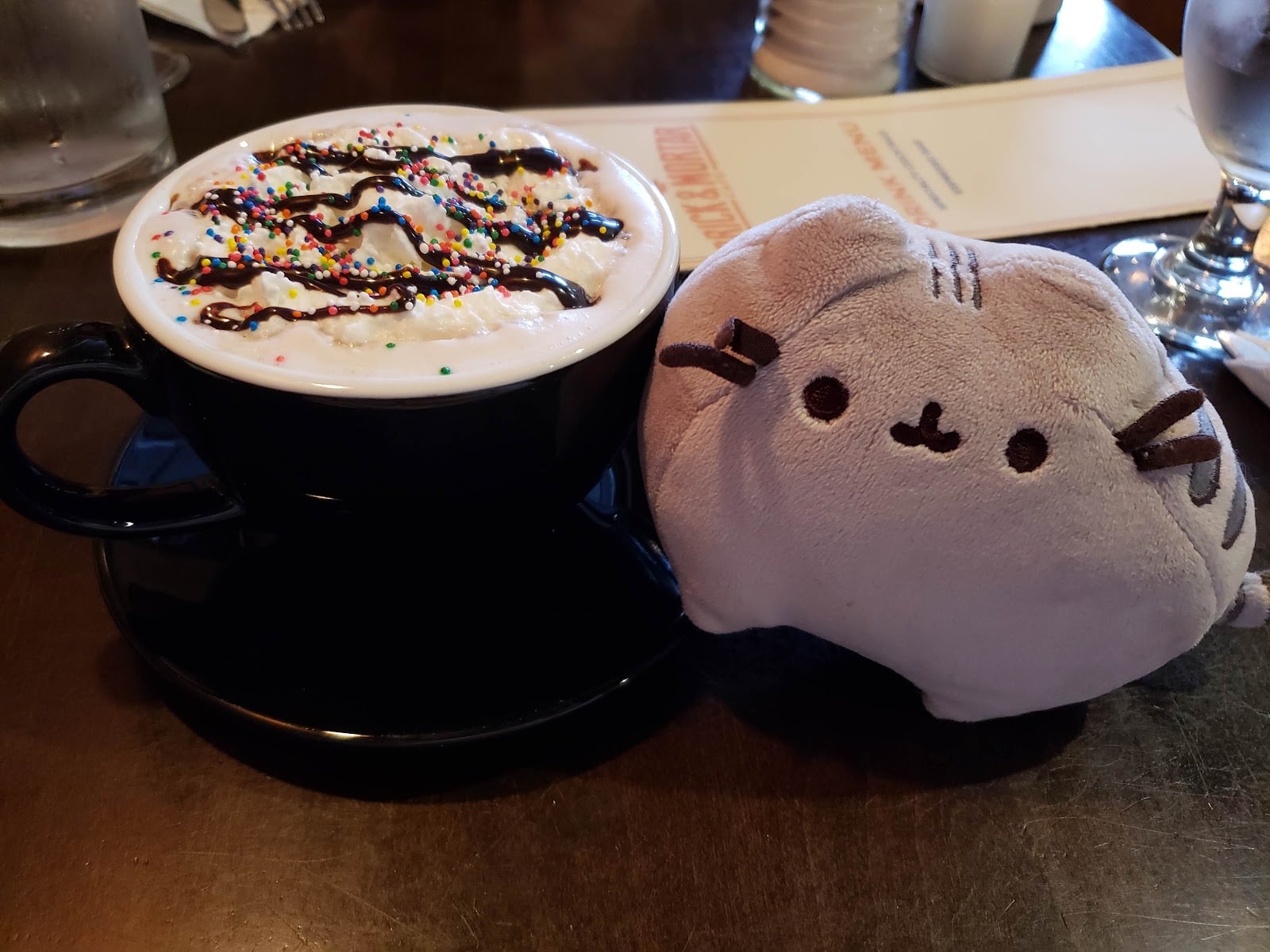 A whipped-cream-topped coffee drink from a customer’s visit.
