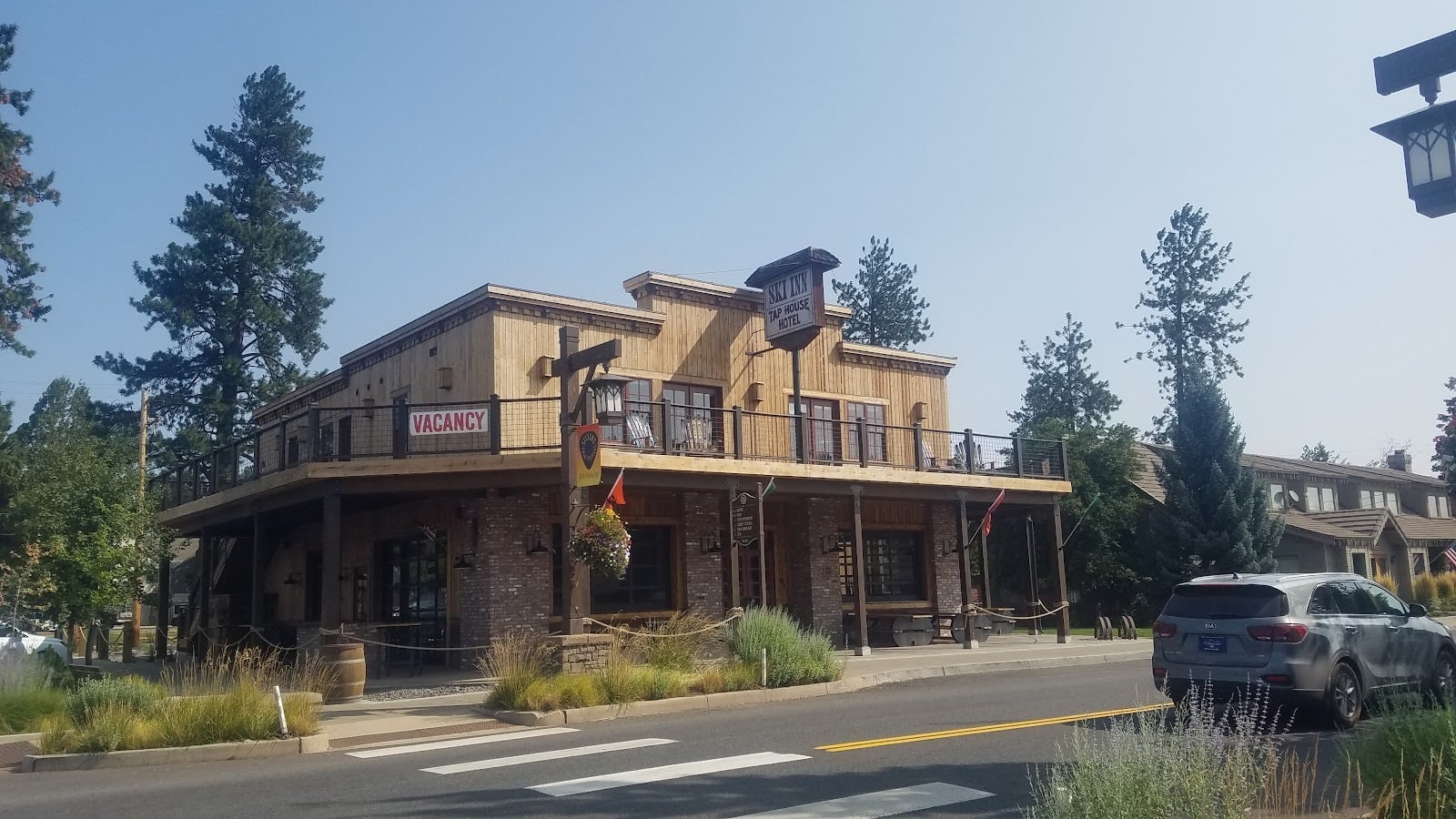 Western-style storefronts in downtown Sisters, photographed in August 2021.