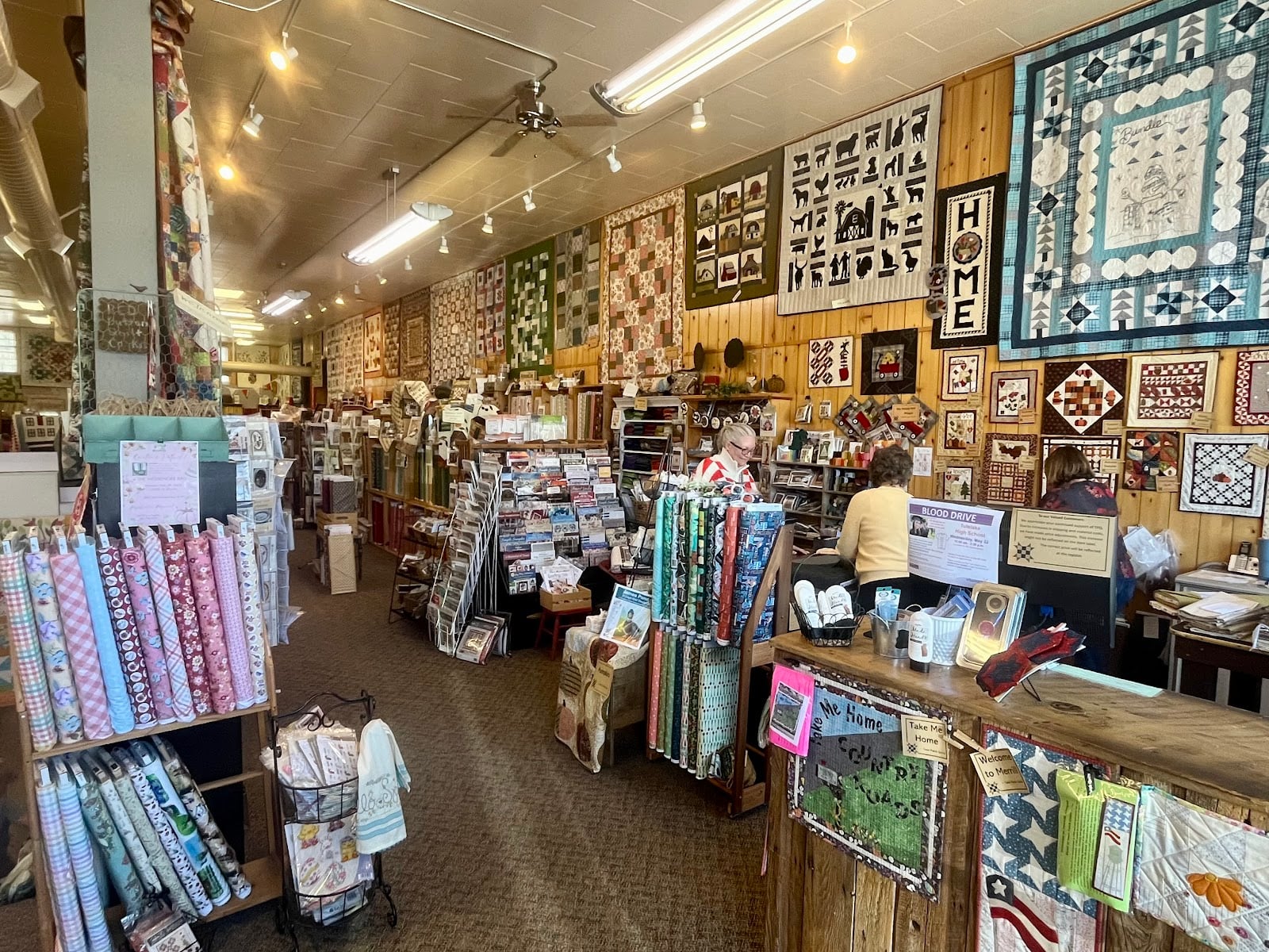 tater-patch-28 Fabric, finished quilts, and project displays inside Tater Patch Quilts in Merrill.
