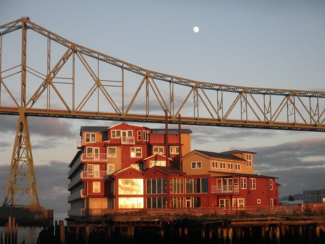 Cannery Pier Hotel and Astoria Megler Bridge Cannery Pier Hotel illuminated beneath the Astoria Megler Bridge beside the Columbia River