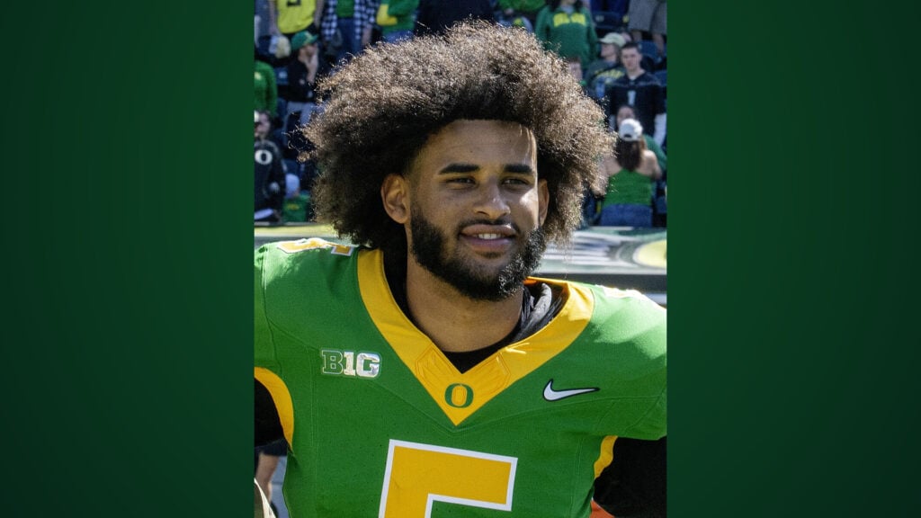 Dante Moore wearing a green Oregon football jersey, centered between dark green gradient panels.