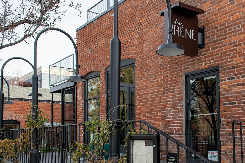 Dear Irene’s sign above the entrance to its red brick restaurant in downtown Bend
