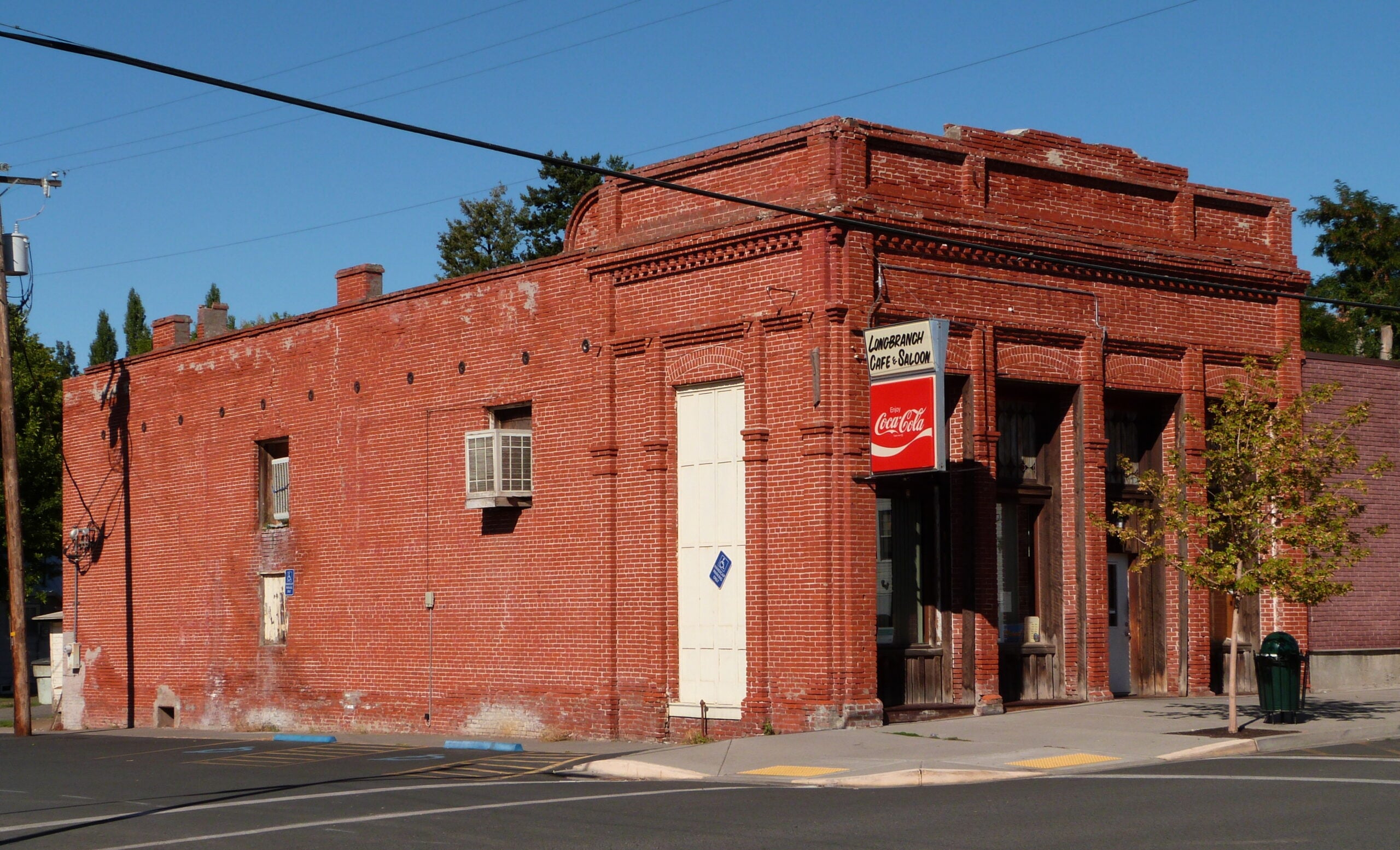 Long Branch Cafe in Weston in September 2013 Red brick Saling and Reese Store building with a Longbranch Cafe and Saloon sign in Weston